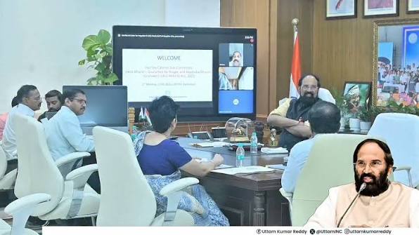 Telangana state officials seated around a conference table during a review meeting